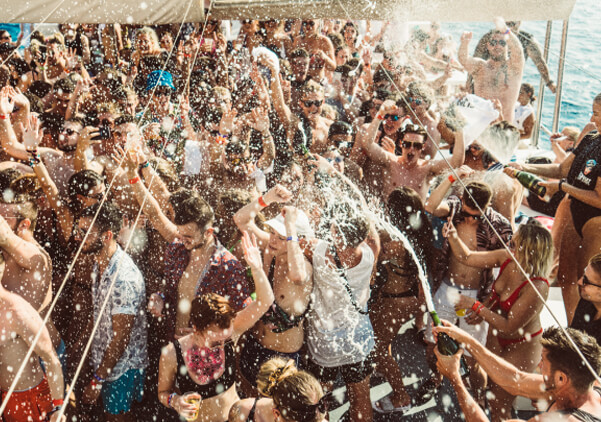 Champagne sprayed onboard the boat party cruise