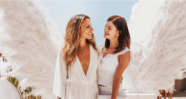 women with white wings
